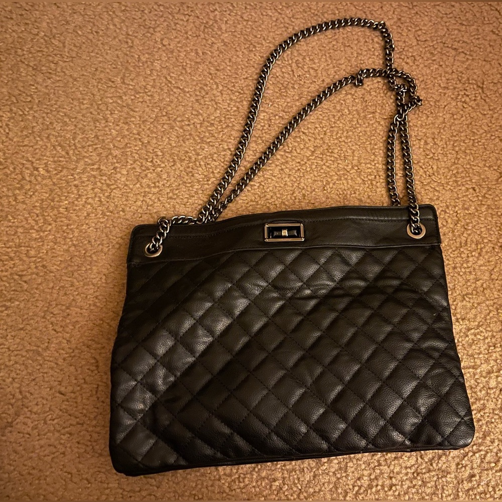 Cute black faux leather shoulder bag.